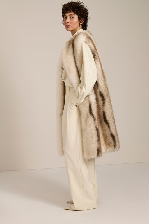 Frost-tipped faux fur long vest with collarless neckline, hook-and-eye closure and side seam pockets.