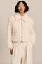 women's curly Faux Fur Jacket in chocolate brown with a cropped silhouette, textured faux fur and zip front.