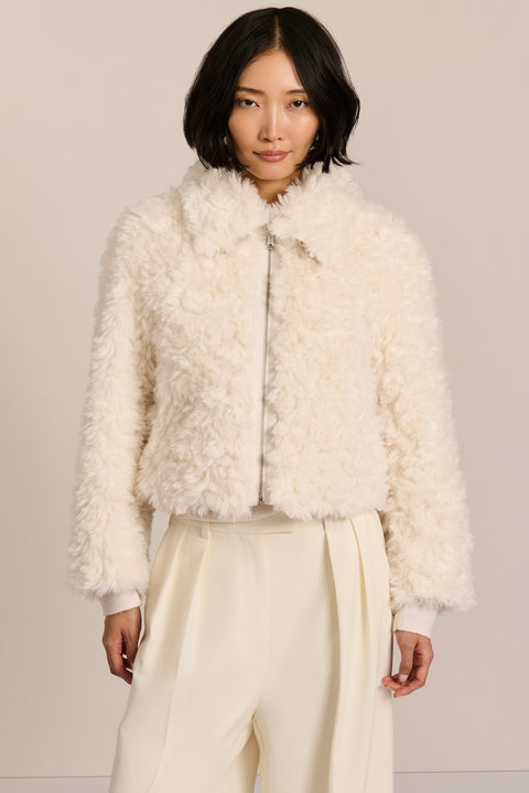 women's curly Faux Fur Jacket in chocolate brown with a cropped silhouette, textured faux fur and zip front.
