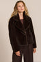 women's ribbed faux fur jacket in chocolate brown with oversized notched lapels and a cropped silhouette.
