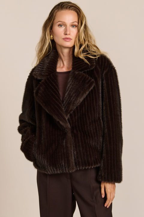 women's ribbed faux fur jacket in chocolate brown with oversized notched lapels and a cropped silhouette.