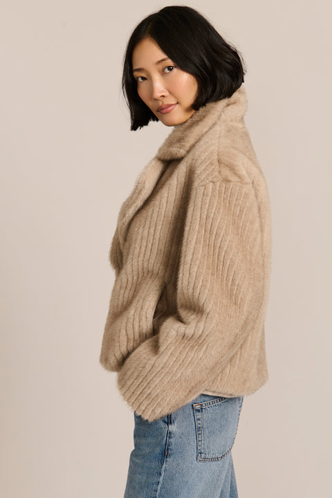 women's ribbed faux fur jacket in chocolate brown with oversized notched lapels and a cropped silhouette.