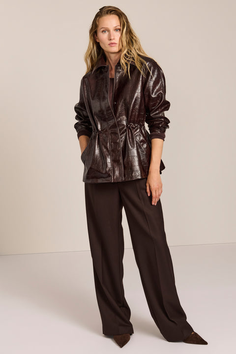 women's brown croc-embossed faux leather jacket with a removable faux fur collar and adjustable drawstring waist.