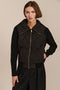Women's quilted bomber jacket with knit sleeves.