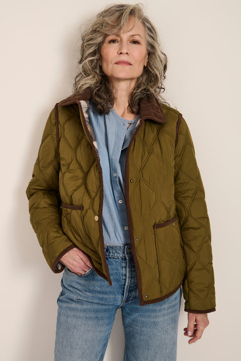 Women's quilted jacket with corduroy collar, snap-front closure, and patch pockets in olive green