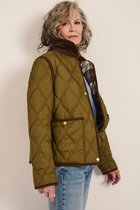 Women's quilted jacket with corduroy collar, snap-front closure, and patch pockets in olive green