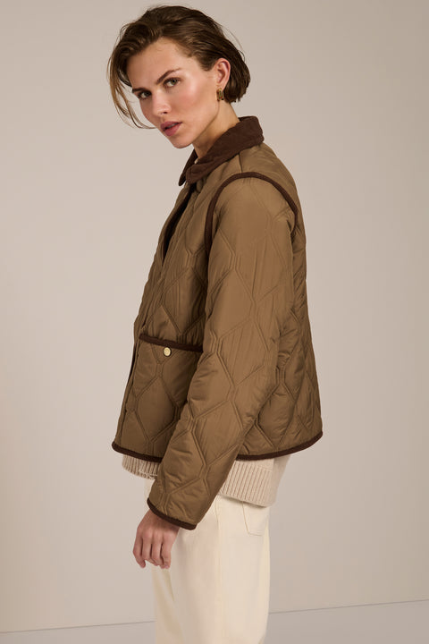 Women's quilted jacket with corduroy collar, snap-front closure, and patch pockets in olive green