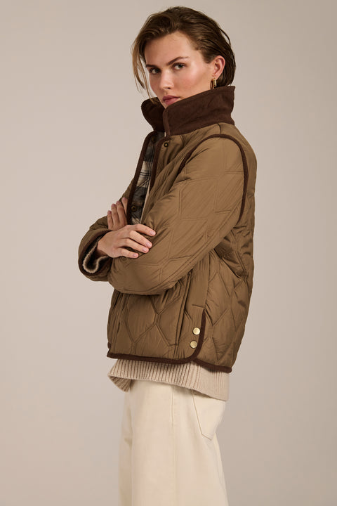 Women's quilted jacket with corduroy collar, snap-front closure, and patch pockets in olive green