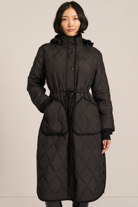 women's Long Quilted Puffer Coat with drawstring waist, hood, diamond quilting and longline silhouette.