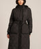 women's Long Quilted Puffer Coat with drawstring waist, hood, diamond quilting and longline silhouette.