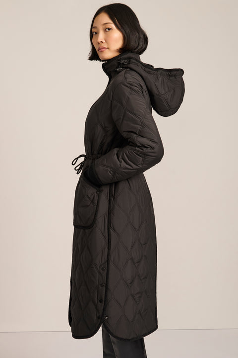 women's Long Quilted Puffer Coat with drawstring waist, hood, diamond quilting and longline silhouette.