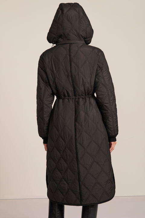 women's Long Quilted Puffer Coat with drawstring waist, hood, diamond quilting and longline silhouette.