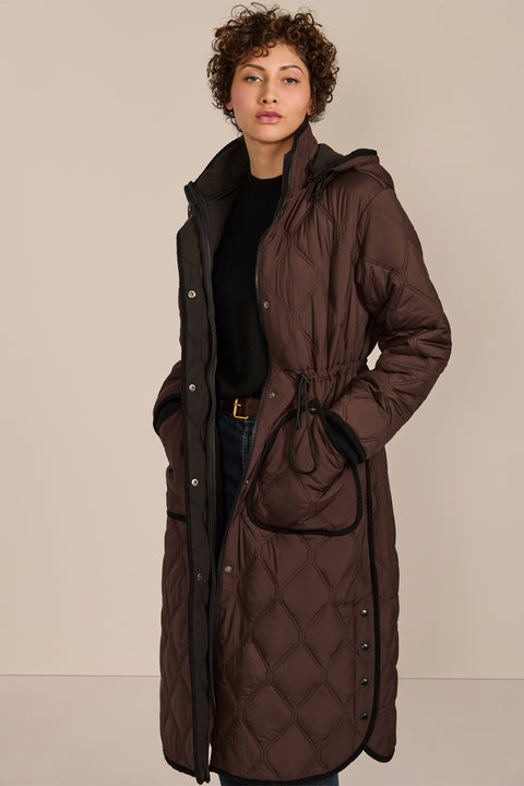 women's Long Quilted Puffer Coat with drawstring waist, hood, diamond quilting and longline silhouette.
