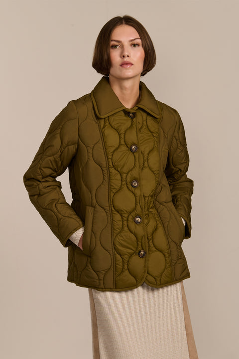 women's Quilted Jacket with onion quilting, pointed collar, button front and a softly shaped waist.