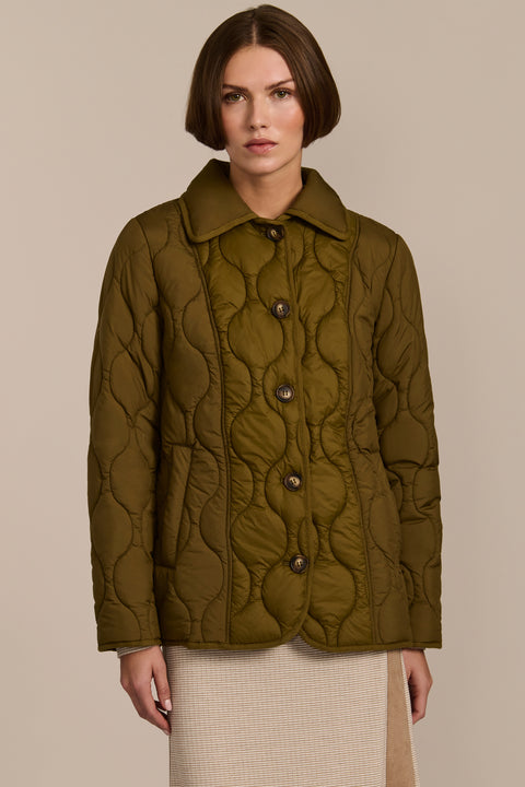 women's Quilted Jacket with onion quilting, pointed collar, button front and a softly shaped waist.