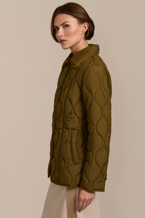 women's Quilted Jacket with onion quilting, pointed collar, button front and a softly shaped waist.
