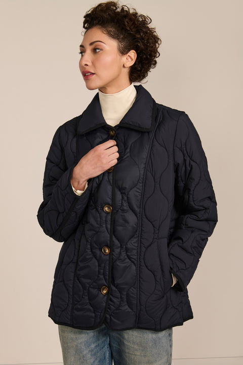 women's Quilted Jacket with onion quilting, pointed collar, button front and a softly shaped waist.