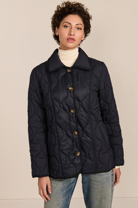 women's Quilted Jacket with onion quilting, pointed collar, button front and a softly shaped waist.