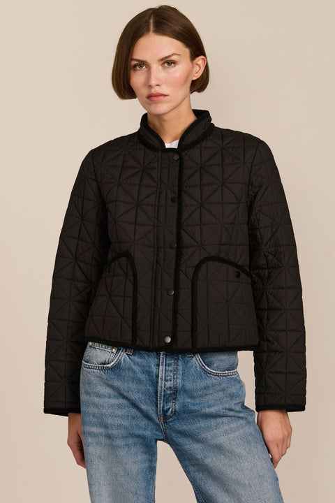Women's Geometric Quilted Jacket with contrast binding, snap front and patch pockets.