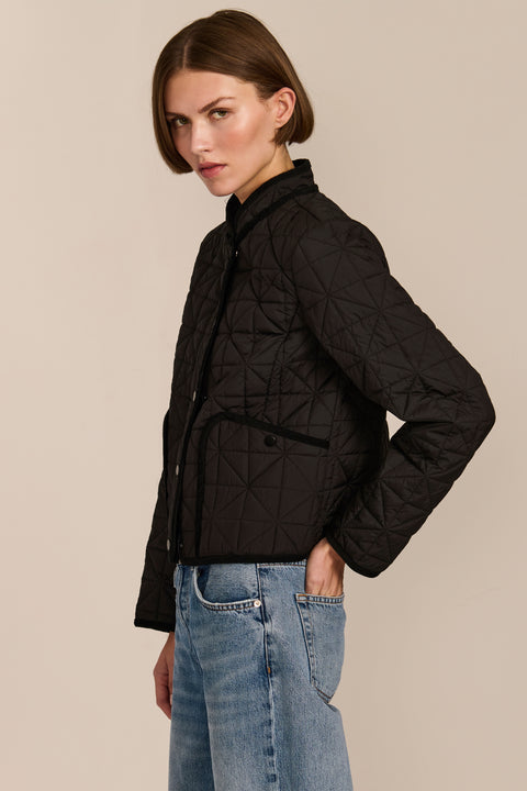 Women's Geometric Quilted Jacket with contrast binding, snap front and patch pockets.