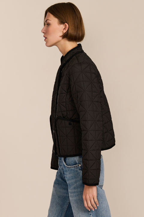 Women's Geometric Quilted Jacket with contrast binding, snap front and patch pockets.