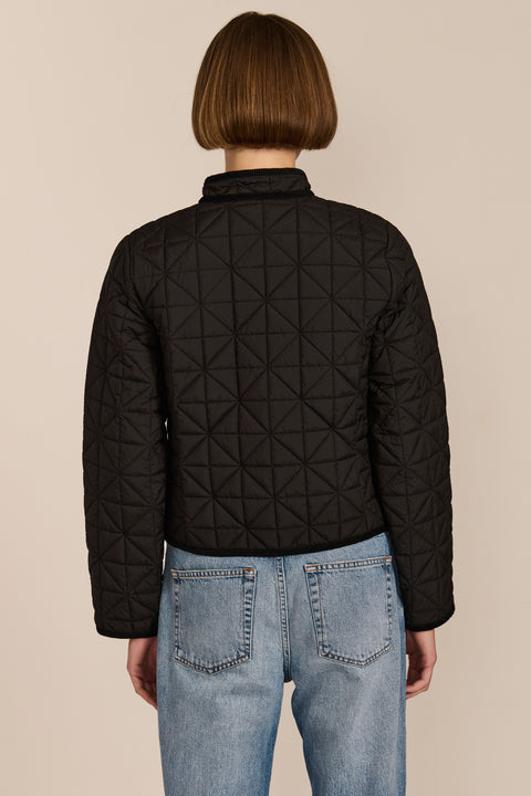 Women's Geometric Quilted Jacket with contrast binding, snap front and patch pockets.