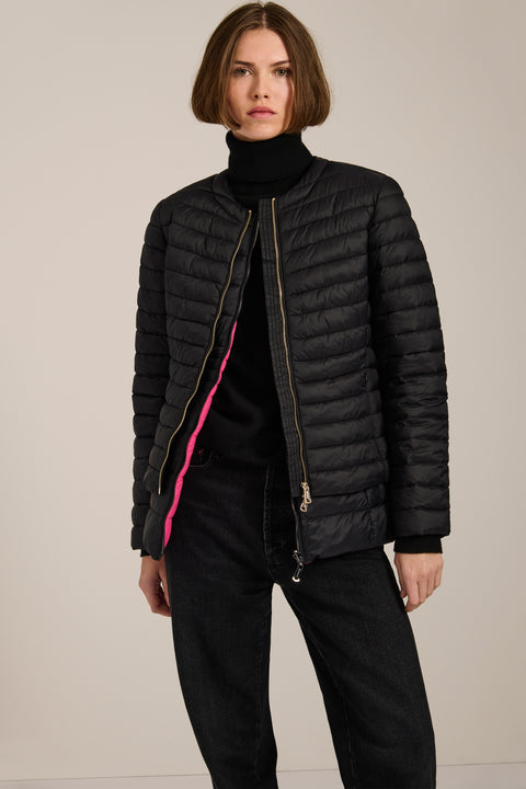 Lightweight packable quilted jacket with crew neckline, recycled insulation and zippered pockets.