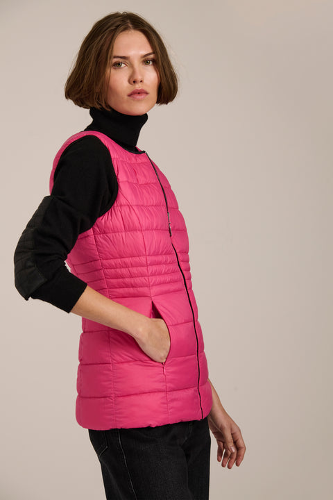 women's reversible black and pink puffer vest.