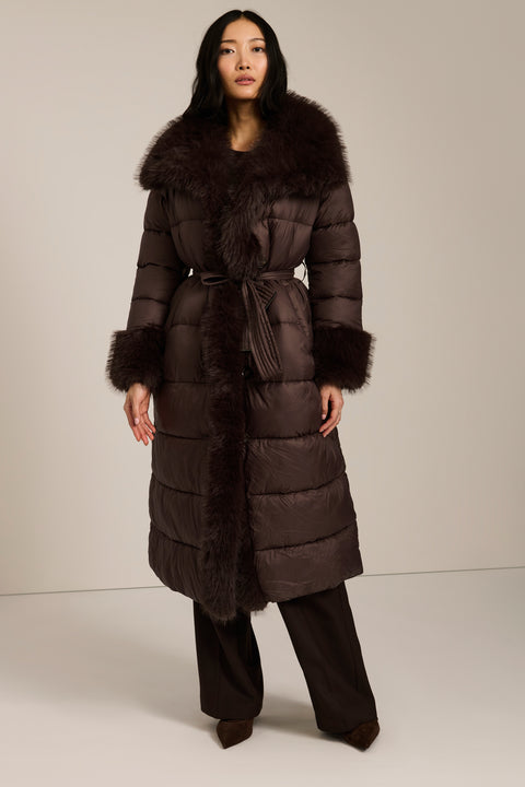 Full-length puffer coat with faux fur shawl collar, faux fur trim, self-tie belt and insulated design.