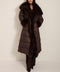Full-length puffer coat with faux fur shawl collar, faux fur trim, self-tie belt and insulated design.
