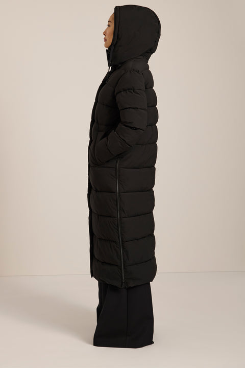 Long insulated puffer coat with removable hood, hidden placket, side zip vents and zippered pockets.