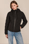 women's Quilted Puffer Jacket with geometric quilting, neoprene side panels, drawstring hood and contrast black zipper.