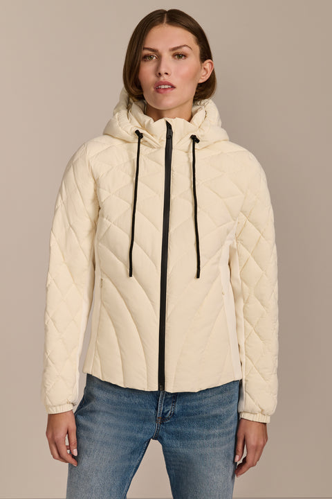 women's Quilted Puffer Jacket with geometric quilting, neoprene side panels, drawstring hood and contrast black zipper.