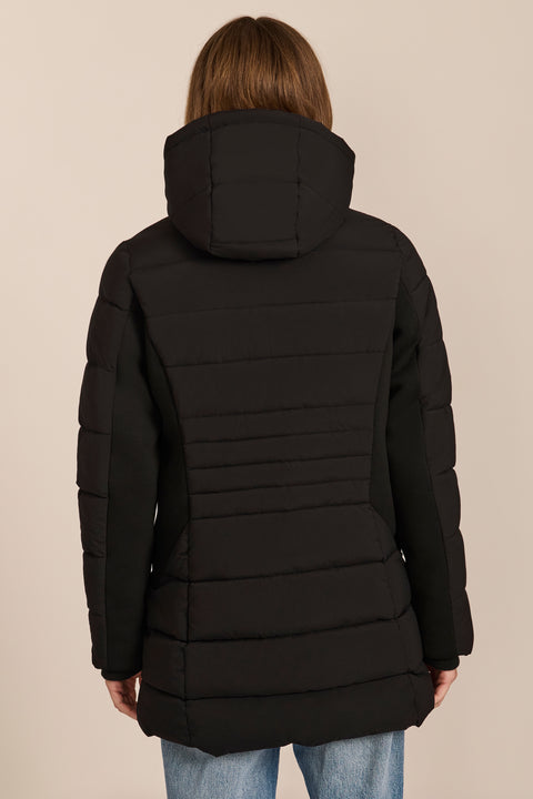 women's hooded puffer coat with horizontal quilting, flexible neoprene side panels, high collar and zip pockets.