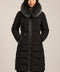 Mid-length hooded puffer coat with faux fur trim, faux leather trim, zip pockets and elastic back waist.