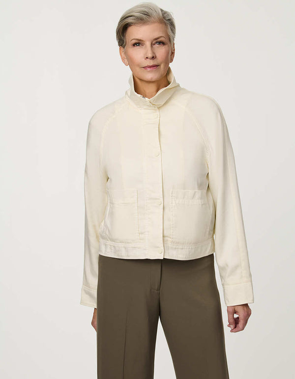 Women’s lightweight spring jacket with a relaxed fit, funnel neck, and open-collar styling option.