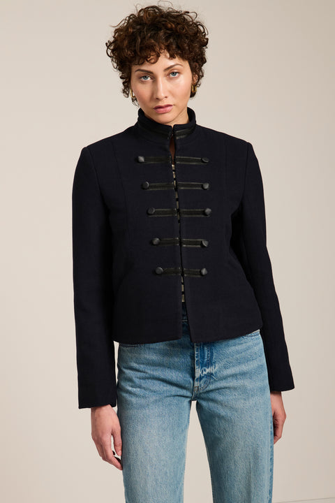 Military-inspired jacket with stand collar, tonal hook closures, angled welt pockets and tailored silhouette.