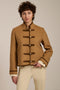 Wool-blend military jacket with faux suede trim, stand collar, frog closures and side-entry welt pockets.