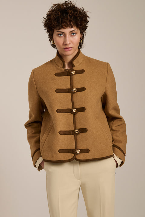 Wool-blend military jacket with faux suede trim, stand collar, frog closures and side-entry welt pockets.