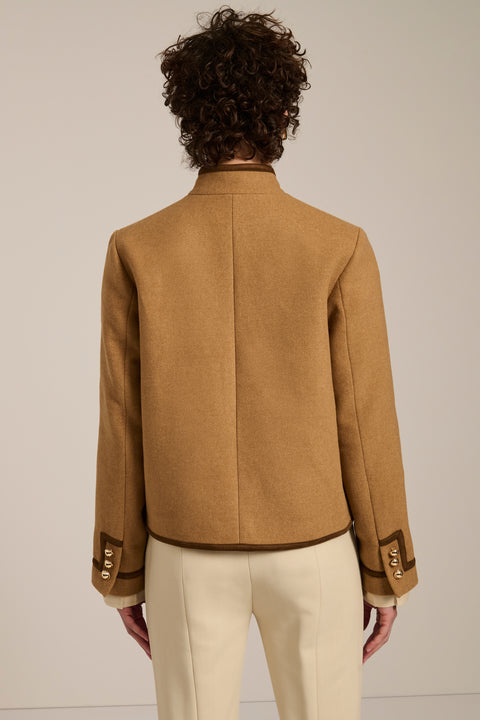 Wool-blend military jacket with faux suede trim, stand collar, frog closures and side-entry welt pockets.