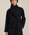 Women's wool-blend wrap jacket with oversized convertible collar and patch pockets.