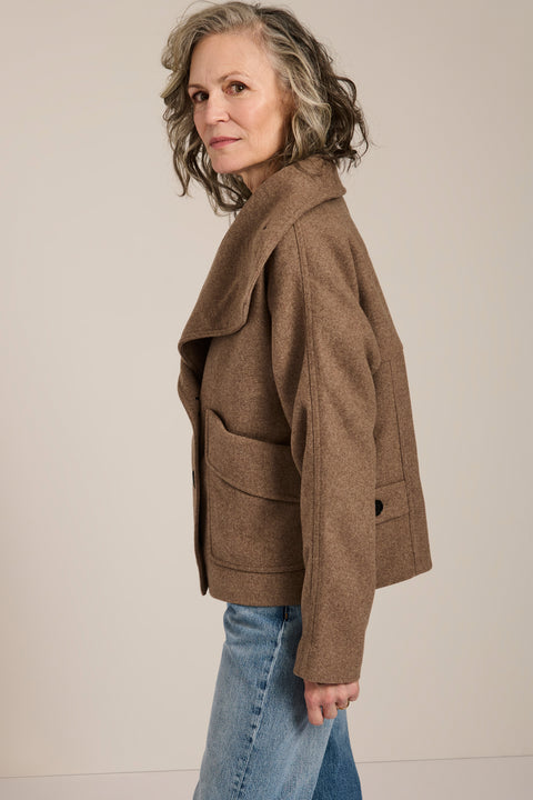 Women's wool-blend wrap jacket with oversized convertible collar and patch pockets.