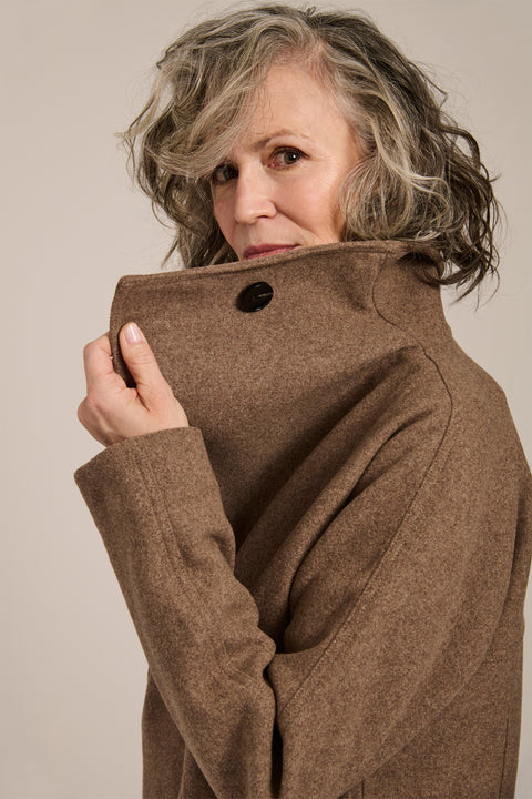 Women's wool-blend wrap jacket with oversized convertible collar and patch pockets.