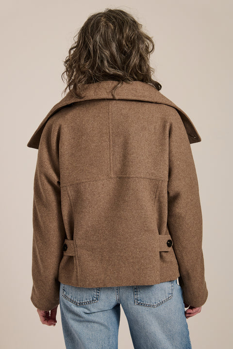 Women's wool-blend wrap jacket with oversized convertible collar and patch pockets.