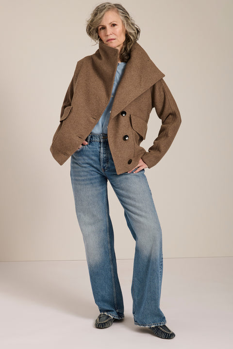 Women's wool-blend wrap jacket with oversized convertible collar and patch pockets.