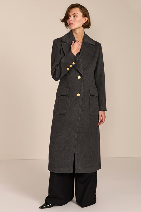 classic  wool coat with calf length cut and patch pockets ideal for adding sophistication to everyday outfits