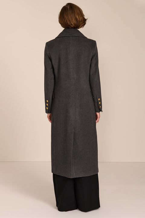 classic  wool coat with calf length cut and patch pockets ideal for adding sophistication to everyday outfits