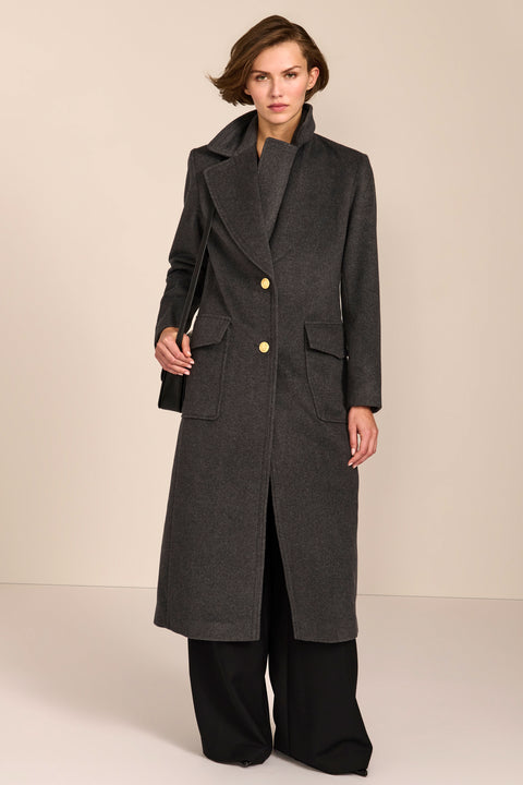 classic  wool coat with calf length cut and patch pockets ideal for adding sophistication to everyday outfits