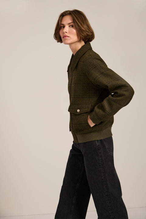 Women's plaid bomber jacket with rib-knit trim, zip-front closure, and utility pockets in olive green