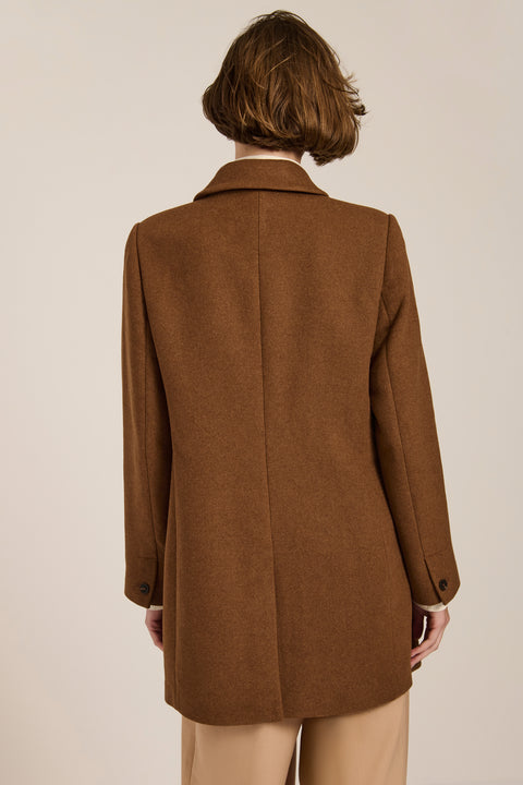 Women's double-breasted blazer coat with tailored lapels and mid-thigh silhouette.